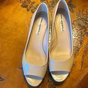 Gorgeous patent leather peal heeled woman's shoe